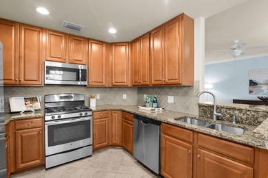 In the Village of Sonoma, enjoy a first-floor end-unit coach on The Rookery At Marco in Florida - for sale on GolfHomes.com, golf home, golf lot