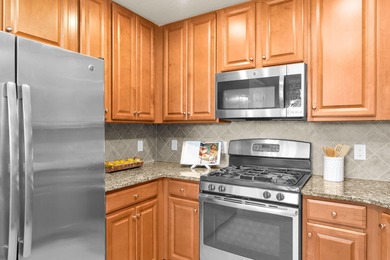 In the Village of Sonoma, enjoy a first-floor end-unit coach on The Rookery At Marco in Florida - for sale on GolfHomes.com, golf home, golf lot