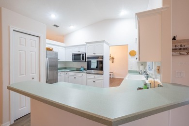 Beautiful Pine Lakes Pool Home -- Move-In Ready!  Welcome to on The Grand Club - Pine Lakes Course in Florida - for sale on GolfHomes.com, golf home, golf lot