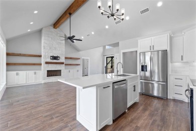 This exquisite custom residence within the great Hideout on Hideout Golf Club and Resort  in Texas - for sale on GolfHomes.com, golf home, golf lot