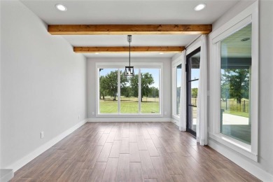 This exquisite custom residence within the great Hideout on Hideout Golf Club and Resort  in Texas - for sale on GolfHomes.com, golf home, golf lot