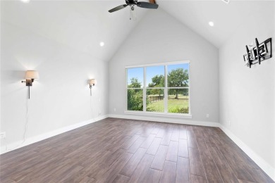 This exquisite custom residence within the great Hideout on Hideout Golf Club and Resort  in Texas - for sale on GolfHomes.com, golf home, golf lot