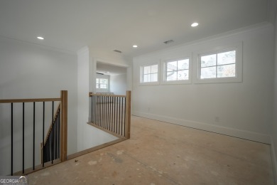 This gorgeous new construction is directly on Osprey Pointe Pond on Harbor Club Golf and Country Club in Georgia - for sale on GolfHomes.com, golf home, golf lot