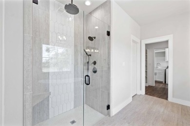 This exquisite custom residence within the great Hideout on Hideout Golf Club and Resort  in Texas - for sale on GolfHomes.com, golf home, golf lot