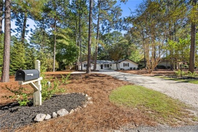 Discover this charming Pinehurst retreat in an ideal blend of on Pinehurst Resort and Country Club in North Carolina - for sale on GolfHomes.com, golf home, golf lot