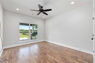 This exquisite custom residence within the great Hideout on Hideout Golf Club and Resort  in Texas - for sale on GolfHomes.com, golf home, golf lot