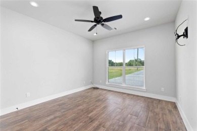 This exquisite custom residence within the great Hideout on Hideout Golf Club and Resort  in Texas - for sale on GolfHomes.com, golf home, golf lot