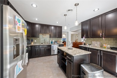 Discover this charming Pinehurst retreat in an ideal blend of on Pinehurst Resort and Country Club in North Carolina - for sale on GolfHomes.com, golf home, golf lot