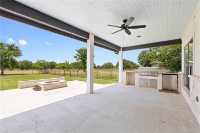 This exquisite custom residence within the great Hideout on Hideout Golf Club and Resort  in Texas - for sale on GolfHomes.com, golf home, golf lot