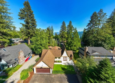 Cozy home with old-world charm coupled with modern conveniences on Hayden Lake Country Club in Idaho - for sale on GolfHomes.com, golf home, golf lot