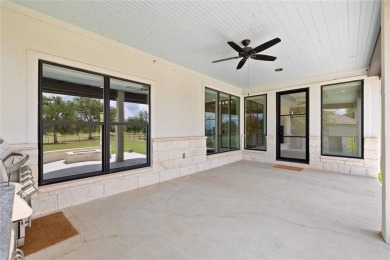 This exquisite custom residence within the great Hideout on Hideout Golf Club and Resort  in Texas - for sale on GolfHomes.com, golf home, golf lot