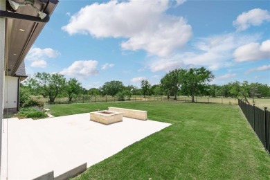 This exquisite custom residence within the great Hideout on Hideout Golf Club and Resort  in Texas - for sale on GolfHomes.com, golf home, golf lot