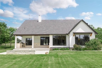 This exquisite custom residence within the great Hideout on Hideout Golf Club and Resort  in Texas - for sale on GolfHomes.com, golf home, golf lot