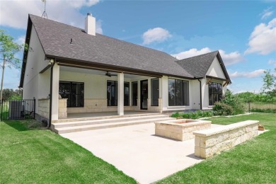 This exquisite custom residence within the great Hideout on Hideout Golf Club and Resort  in Texas - for sale on GolfHomes.com, golf home, golf lot