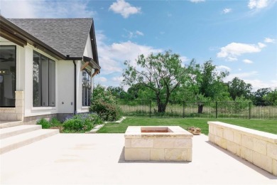 This exquisite custom residence within the great Hideout on Hideout Golf Club and Resort  in Texas - for sale on GolfHomes.com, golf home, golf lot