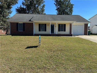 Welcome to this beautifully renovated 3-bedroom, 2-bathroom home on Hope Mills Golf and Country Club in North Carolina - for sale on GolfHomes.com, golf home, golf lot