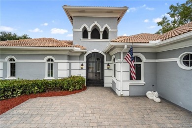 Welcome to your own private sanctuary-an elegant courtyard pool on The Cape Club of Palm City in Florida - for sale on GolfHomes.com, golf home, golf lot