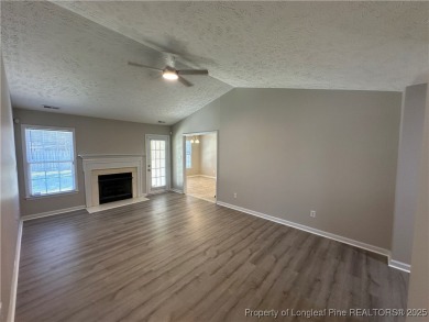Welcome to this beautifully renovated 3-bedroom, 2-bathroom home on Hope Mills Golf and Country Club in North Carolina - for sale on GolfHomes.com, golf home, golf lot