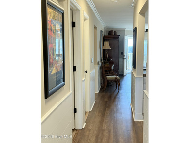 Welcome to coastal living at its finest. This luxurious home on Brick Landing Plantation Yacht and Golf Club in North Carolina - for sale on GolfHomes.com, golf home, golf lot