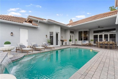 Welcome to your own private sanctuary-an elegant courtyard pool on The Cape Club of Palm City in Florida - for sale on GolfHomes.com, golf home, golf lot