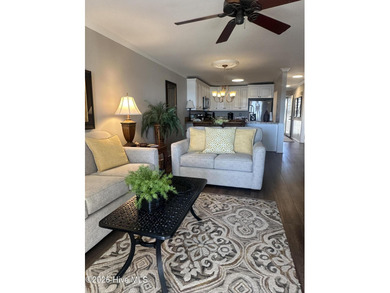 Welcome to coastal living at its finest. This luxurious home on Brick Landing Plantation Yacht and Golf Club in North Carolina - for sale on GolfHomes.com, golf home, golf lot