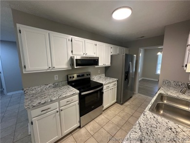 Welcome to this beautifully renovated 3-bedroom, 2-bathroom home on Hope Mills Golf and Country Club in North Carolina - for sale on GolfHomes.com, golf home, golf lot