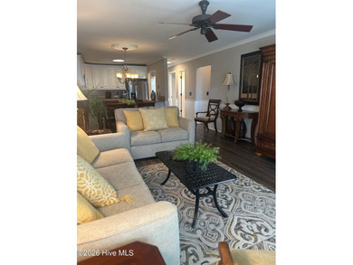 Welcome to coastal living at its finest. This luxurious home on Brick Landing Plantation Yacht and Golf Club in North Carolina - for sale on GolfHomes.com, golf home, golf lot