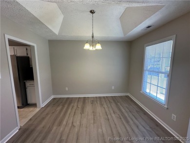 Welcome to this beautifully renovated 3-bedroom, 2-bathroom home on Hope Mills Golf and Country Club in North Carolina - for sale on GolfHomes.com, golf home, golf lot