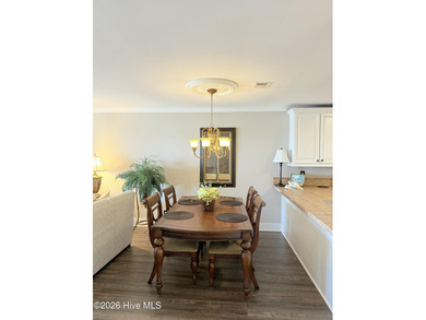 Welcome to coastal living at its finest. This luxurious home on Brick Landing Plantation Yacht and Golf Club in North Carolina - for sale on GolfHomes.com, golf home, golf lot