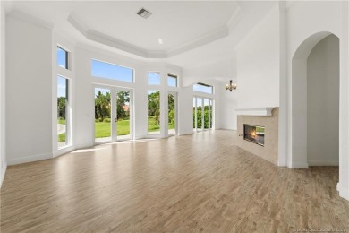 Welcome to your own private sanctuary-an elegant courtyard pool on The Cape Club of Palm City in Florida - for sale on GolfHomes.com, golf home, golf lot
