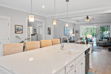 This stunning home in The Towns of St. James Plantation offers on Members Club At St. James Plantation in North Carolina - for sale on GolfHomes.com, golf home, golf lot