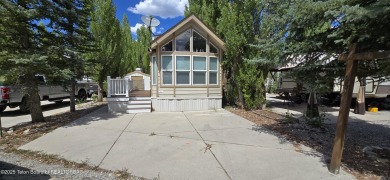 Nestled in the heart of Star Valley Ranch RV Park, this on Star Valley RV Golf Course in Wyoming - for sale on GolfHomes.com, golf home, golf lot