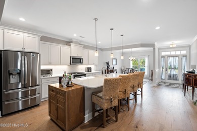 This stunning home in The Towns of St. James Plantation offers on Members Club At St. James Plantation in North Carolina - for sale on GolfHomes.com, golf home, golf lot