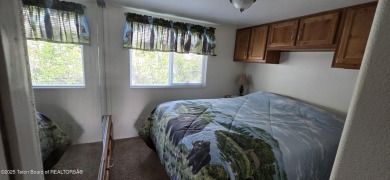 Nestled in the heart of Star Valley Ranch RV Park, this on Star Valley RV Golf Course in Wyoming - for sale on GolfHomes.com, golf home, golf lot