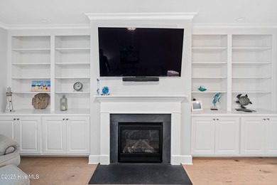 This stunning home in The Towns of St. James Plantation offers on Members Club At St. James Plantation in North Carolina - for sale on GolfHomes.com, golf home, golf lot