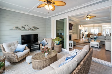 This stunning home in The Towns of St. James Plantation offers on Members Club At St. James Plantation in North Carolina - for sale on GolfHomes.com, golf home, golf lot