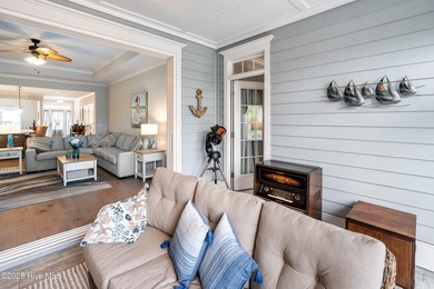 This stunning home in The Towns of St. James Plantation offers on Members Club At St. James Plantation in North Carolina - for sale on GolfHomes.com, golf home, golf lot