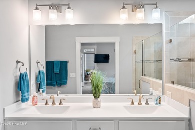 This stunning home in The Towns of St. James Plantation offers on Members Club At St. James Plantation in North Carolina - for sale on GolfHomes.com, golf home, golf lot