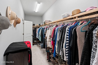 This stunning home in The Towns of St. James Plantation offers on Members Club At St. James Plantation in North Carolina - for sale on GolfHomes.com, golf home, golf lot