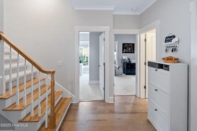 This stunning home in The Towns of St. James Plantation offers on Members Club At St. James Plantation in North Carolina - for sale on GolfHomes.com, golf home, golf lot