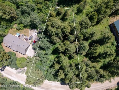 This beautifully treed half acre lot is just a short walking on Star Valley RV Golf Course in Wyoming - for sale on GolfHomes.com, golf home, golf lot