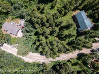 This beautifully treed half acre lot is just a short walking on Star Valley RV Golf Course in Wyoming - for sale on GolfHomes.com, golf home, golf lot