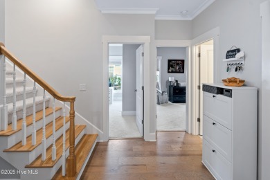 This stunning home in The Towns of St. James Plantation offers on Members Club At St. James Plantation in North Carolina - for sale on GolfHomes.com, golf home, golf lot