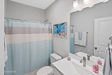 This stunning home in The Towns of St. James Plantation offers on Members Club At St. James Plantation in North Carolina - for sale on GolfHomes.com, golf home, golf lot