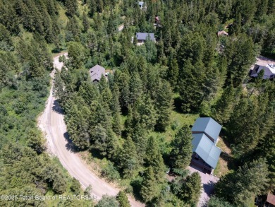 This beautifully treed half acre lot is just a short walking on Star Valley RV Golf Course in Wyoming - for sale on GolfHomes.com, golf home, golf lot