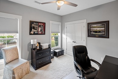 This stunning home in The Towns of St. James Plantation offers on Members Club At St. James Plantation in North Carolina - for sale on GolfHomes.com, golf home, golf lot