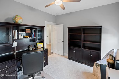 This stunning home in The Towns of St. James Plantation offers on Members Club At St. James Plantation in North Carolina - for sale on GolfHomes.com, golf home, golf lot