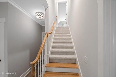 This stunning home in The Towns of St. James Plantation offers on Members Club At St. James Plantation in North Carolina - for sale on GolfHomes.com, golf home, golf lot