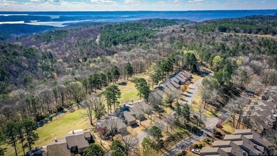 Welcome to your dream townhome nestled within the picturesque on Indian Hills Country Club in Arkansas - for sale on GolfHomes.com, golf home, golf lot