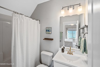 This stunning home in The Towns of St. James Plantation offers on Members Club At St. James Plantation in North Carolina - for sale on GolfHomes.com, golf home, golf lot